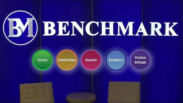 Team members explain the Benchmark Magic